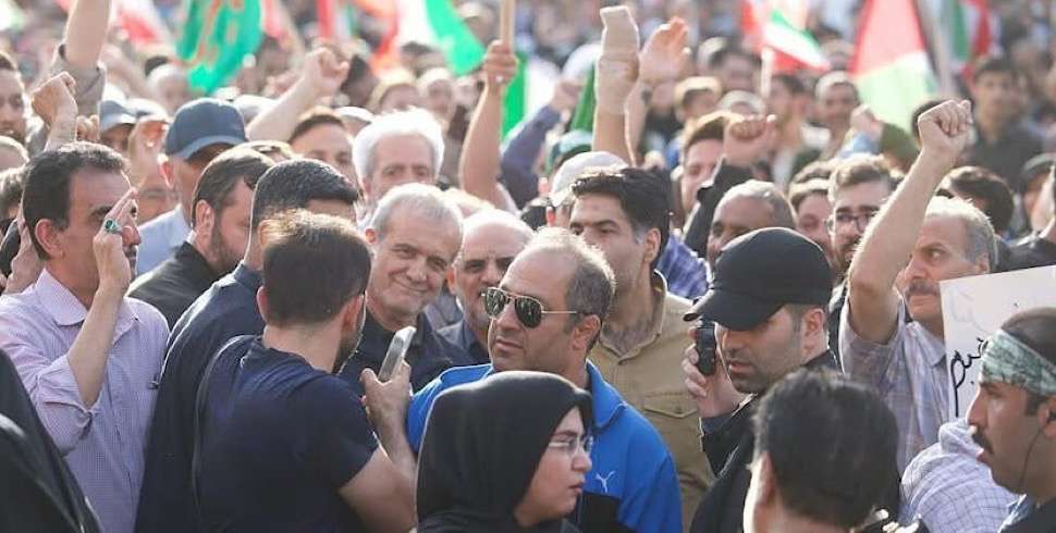 Iranian President joins mass protests in Tehran against US strikes