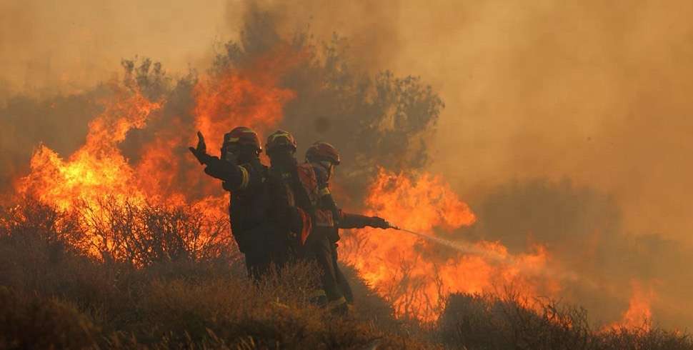 Over 5,000 evacuated as wildfire burns in Crete